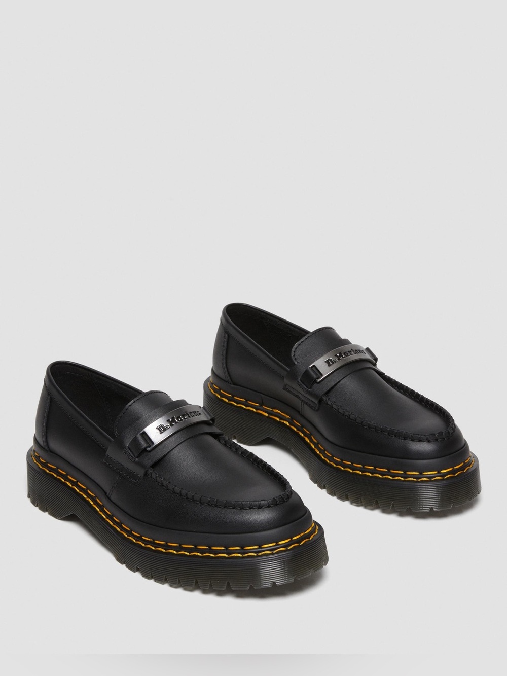 Dr. Martens Black Leather Penny Loafers with Yellow Stitching and Silver Plate